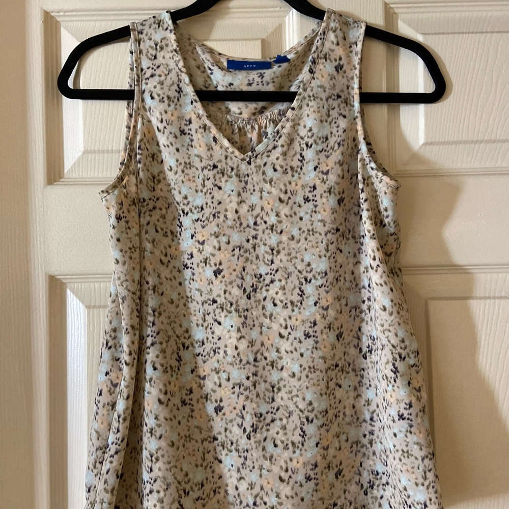 Sleeveless blouse. Perfect for warm weather or use a cardigan for fall.